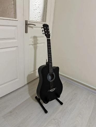 Акустическая гитара, классический дредноут с вырезом (cutaway)