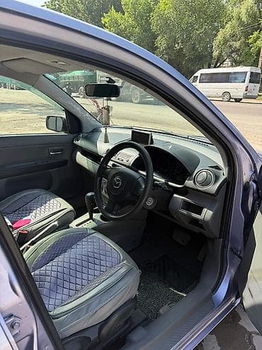 ниссан марч 1998: Mazda Demio: 2005 г., 1.3 л, Автомат, Бензин, Хэтчбэк — 3
