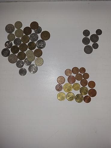 Коллекция разносортных монет из нескольких стран и периодов. Состав