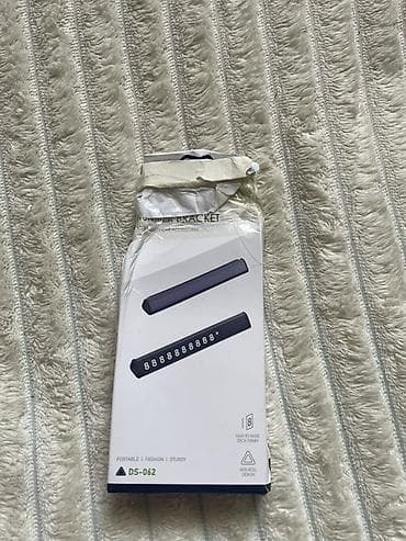 подномерники: Универсальная табличка с номером телефона для автомобиля DADU (модель — 2