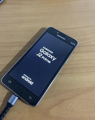 Samsung Galaxy J2 Prime, Б/у, 32 ГБ, цвет - Золотой, 2 SIM
