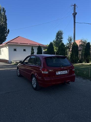ваз 2112: Mazda 323: 1998 г., 1.5 л, Механика, Бензин, Хэтчбэк — 5