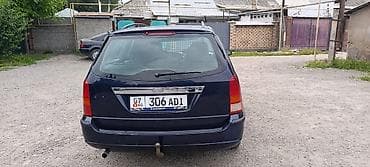 mini cuper: Ford Focus: 2003 г., 1.6 л, Механика, Бензин, Универсал — 3