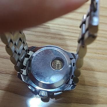 butun клатч: Часы Tissot (Swiss Made), кварцевый хронограф. - Корпус и браслет из — 1