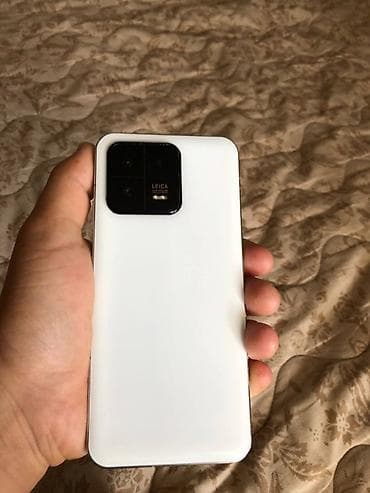 хиоми 17: Xiaomi, 13, 256 ГБ, цвет - Белый, 1 SIM, 2 SIM — 1