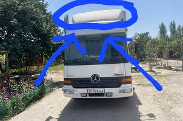 глушитель на авто: Решетка радиатора MAN Оригинал — 6