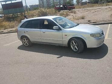 рейка на 210: Mazda 323: 2003 г., 1.5 л, Механика, Универсал — 7