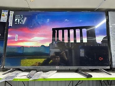 tab s5e: Телевизор LG 4K UHD - Диагональ экрана: около 43–49" (визуально — 1