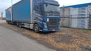 kia carnaval: Грузовой автопоезд Volvo FH с тентованным кузовом (шторка) и прицепом — 2