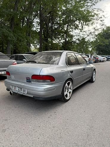 Унаа сатуу: Subaru Impreza: 1994 г., 2 л, Кол менен иштөөчү, Бензин, Седан — 4