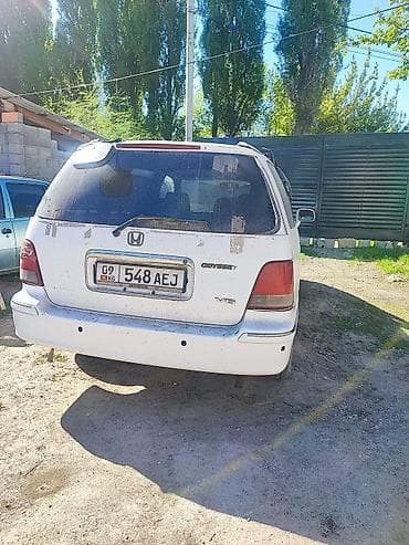 одесей: Honda Odyssey: 1999 г., 3 л, Автомат, Газ, Универсал — 4