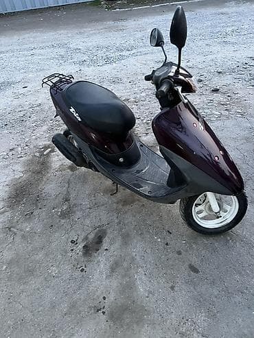 Скутер Honda Dio (серия AF) — компактный городской 2‑тактный скутер с