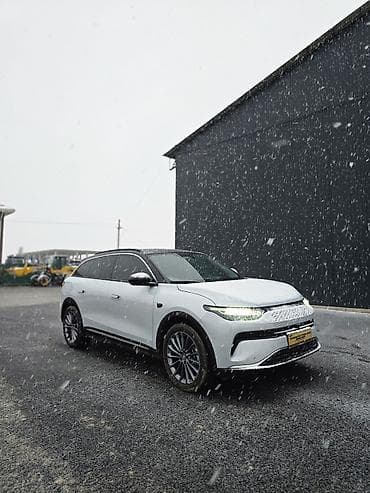 детский костюм тёплый на зиму: Электромобиль LEAPMOTOR — интерьер и мультимедиа премиум-класса — 6