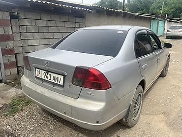Транспорт: Honda Civic седан, поколение VII ( 2002 гг.), серебристый цвет — 4