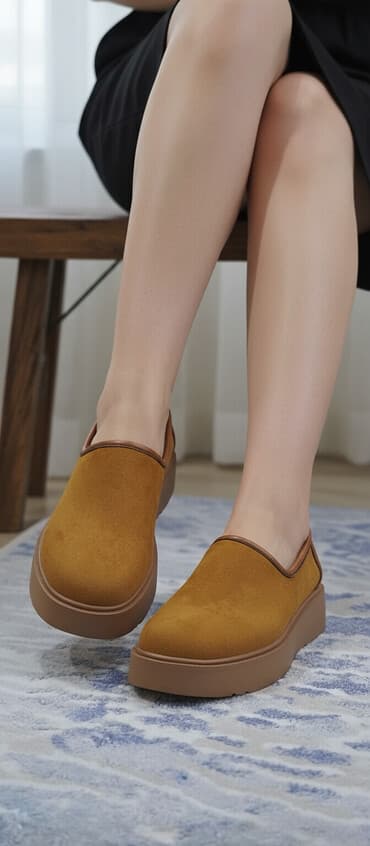 Сабо на платформе обеспечивают комфорт и стиль. Модель имеет