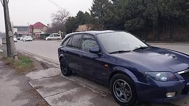 bl5 subaru: Mazda 323: 2003 г., Механика, Газ, Хэтчбэк — 7