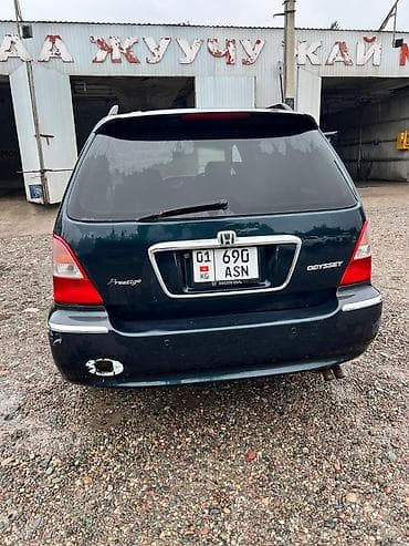 обивка: Honda Odyssey: 2000 г., Автомат, Минивэн — 3