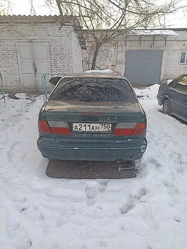 3 sfe: Nissan Almera: 1997 г., Механика, Седан — 2