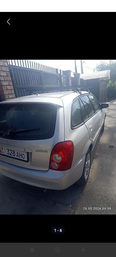 kirgiz auto: Mazda 323: 2002 г., 1.6 л, Механика, Бензин, Хэтчбэк — 2