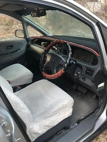 салон на авто: Mitsubishi Chariot: 1996 г., Бензин, Универсал — 9
