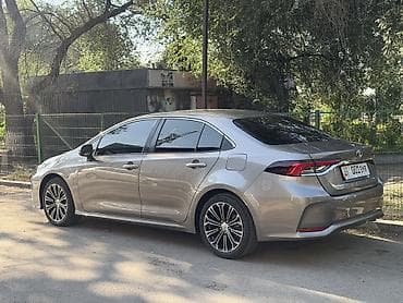 byd e2 2019: Toyota Corolla: 2021 г., 1.8 л, Вариатор, Гибрид, Седан — 4