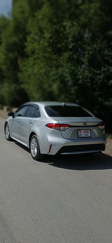runx alex: Toyota Corolla: 2020 г., 1.8 л, Вариатор, Гибрид, Седан — 4
