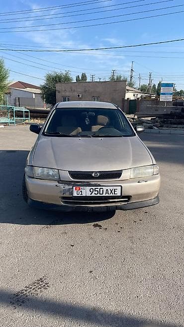каропка автомат: Mazda 323: 1999 г., 1.5 л, Автомат, Газ, Седан — 4