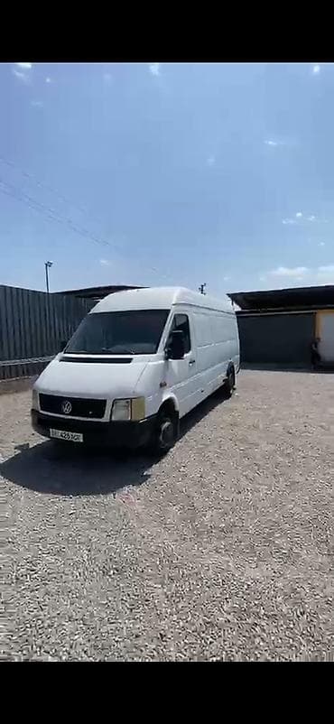 шлем с визором: Volkswagen LT длиннобазный, высокий кузов, белый фургон. Кузов: - — 2