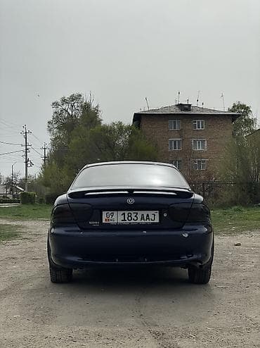 радиомодуль бмв: Mazda 626: 1999 г., 2 л, Ручные, Бензин, Седан — 5