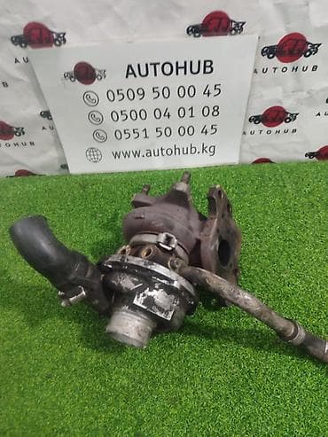 Детали двигателя и моторы в сборе: Турбина Subaru — 1