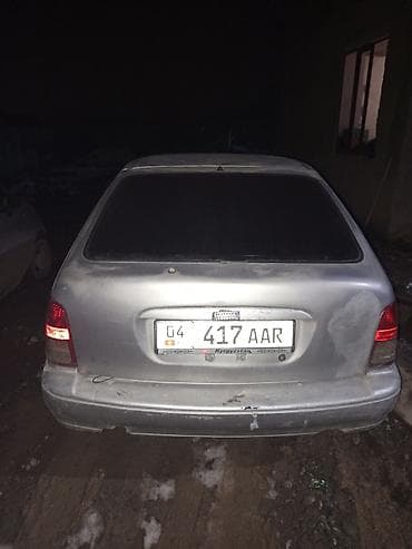 полики для авто: Серебристый пятидверный хэтчбек. Кузов: - 5 дверей, тонированное — 2