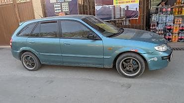 мазда 525: Mazda Familia: 2002 г., 1.6 л, Ручные, Бензин, Универсал — 1