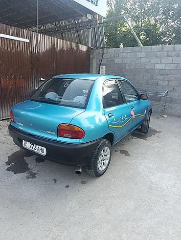 smart car: Mazda 121: 1991 г., 1.3 л, Механика, Бензин, Седан — 5