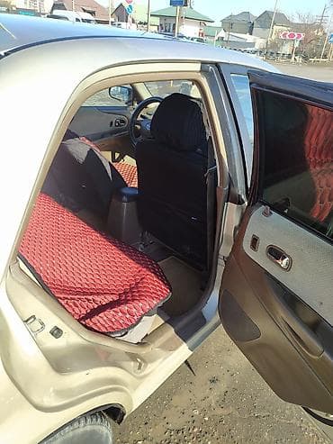 mazda 2: Mazda 323: 2000 г., 1.5 л, Механика, Бензин, Седан — 9