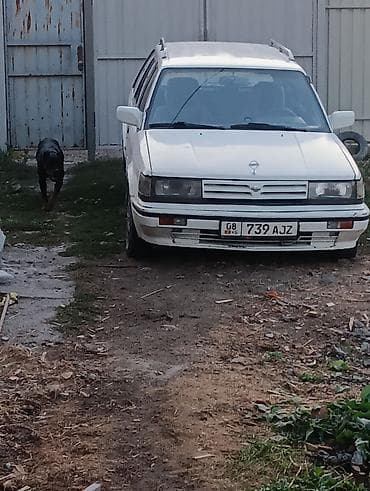 машина byd e2: Nissan Sunny: 1990 г., Бензин, Универсал — 8
