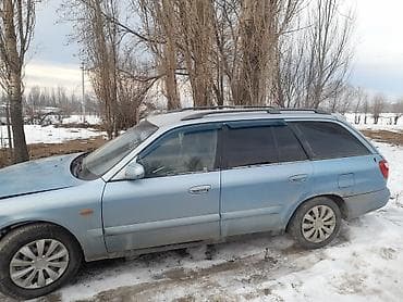 автомобили степ: Mazda 626: 2000 г., 2 л, Механика, Бензин, Универсал — 3