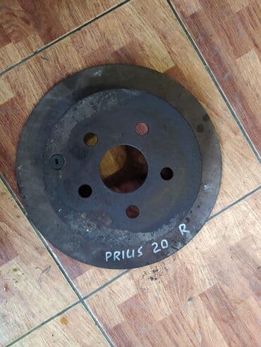 перфорированные тормозные диски: Toyota Prius 20 тормозной диск, Тойота Приус 20 диск тормозной Задний — 2