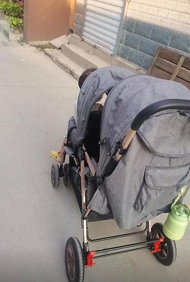 Прогулочная коляска для двоих детей (тандем, одно место спереди — 4