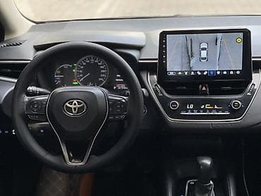гибрит: Toyota Corolla: 2019 г., 1.8 л, Автомат, Гибрид, Седан — 8