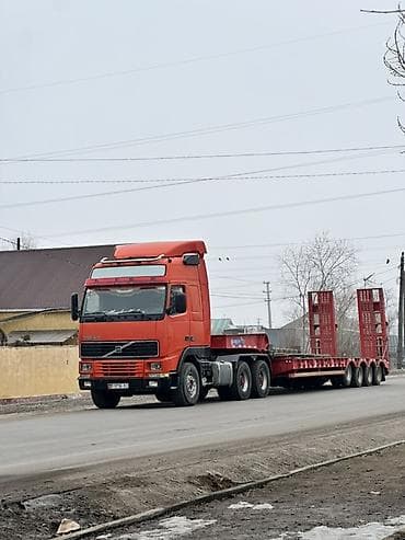 124 е: Прицеп, Volvo, Трал — 1