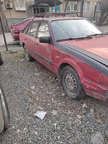 mitsubishi eclipse: Mazda 2: 1986 г., 0.2 л, Механика, Бензин, Хэтчбэк — 1