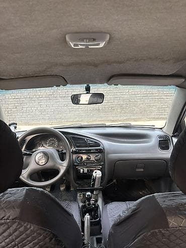 даевоо колос: Daewoo Lanos: 2007 г., 1.3 л, Кол менен иштөөчү, Бензин, Седан — 8