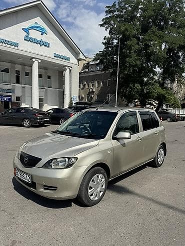 Транспорт: Mazda Demio: 2003 г., 1.3 л, Автомат, Бензин, Хэтчбэк — 2