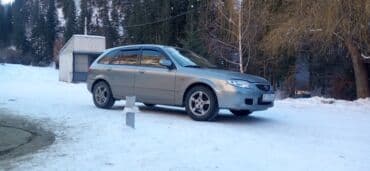 Mazda 323: 2002 г., 1.6 л, Механика, Бензин, Седан