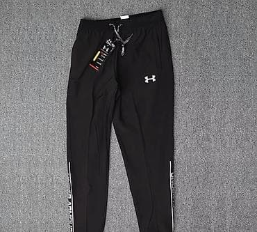 Спортивные брюки Under Armour, черного цвета. - Прямой крой