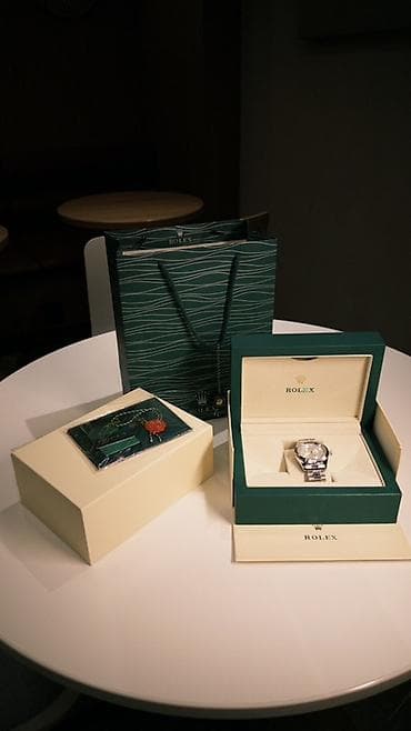 Rolex Oyster Perpetual Datejust — классические швейцарские часы со