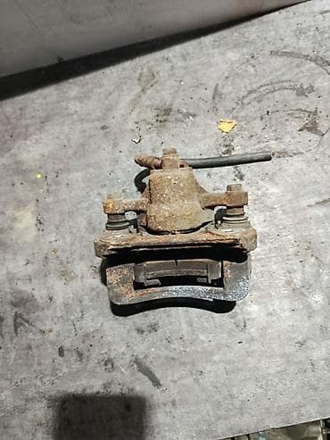 Унаа тетиктери: Алдыңкы сол суппорт Hyundai 2009 г., Оригинал — 2