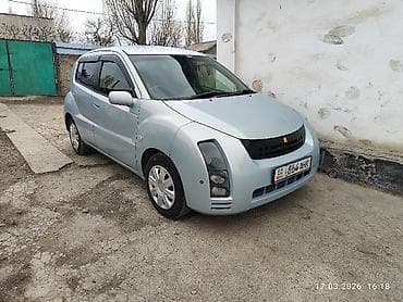 mitsubishi спейс стар: Компактный 5‑дверный хэтчбек, правый руль. Серебристо‑голубой цвет — 4