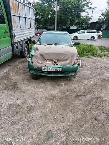 хетчбэк: Зеленый седан компакт-класса (4 двери). Подойдет как донор запчастей — 2