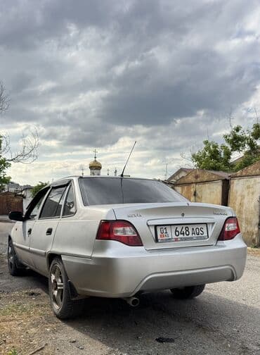 срочно продам авто в связи с переездом: Daewoo Nexia: 2011 г., 1.5 л, Механика, Бензиновая, Седан — 4